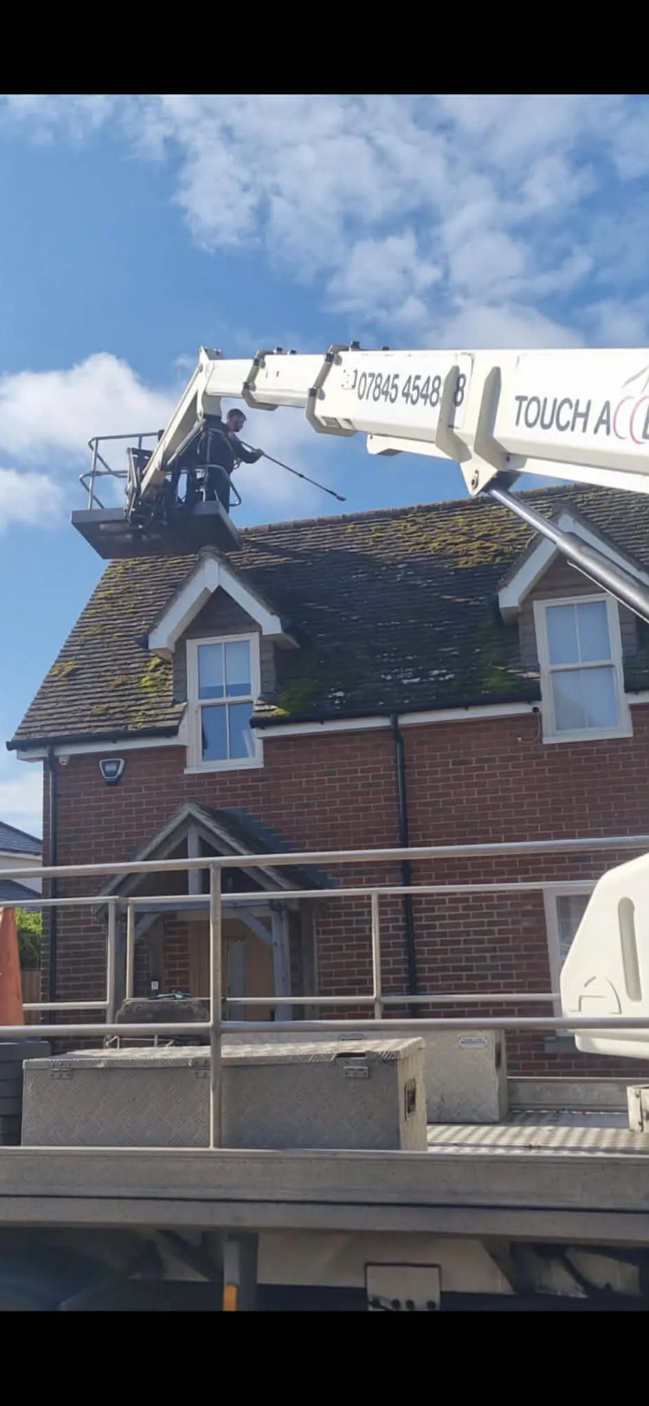 Roof moss removal on a tiled roof in Southampton